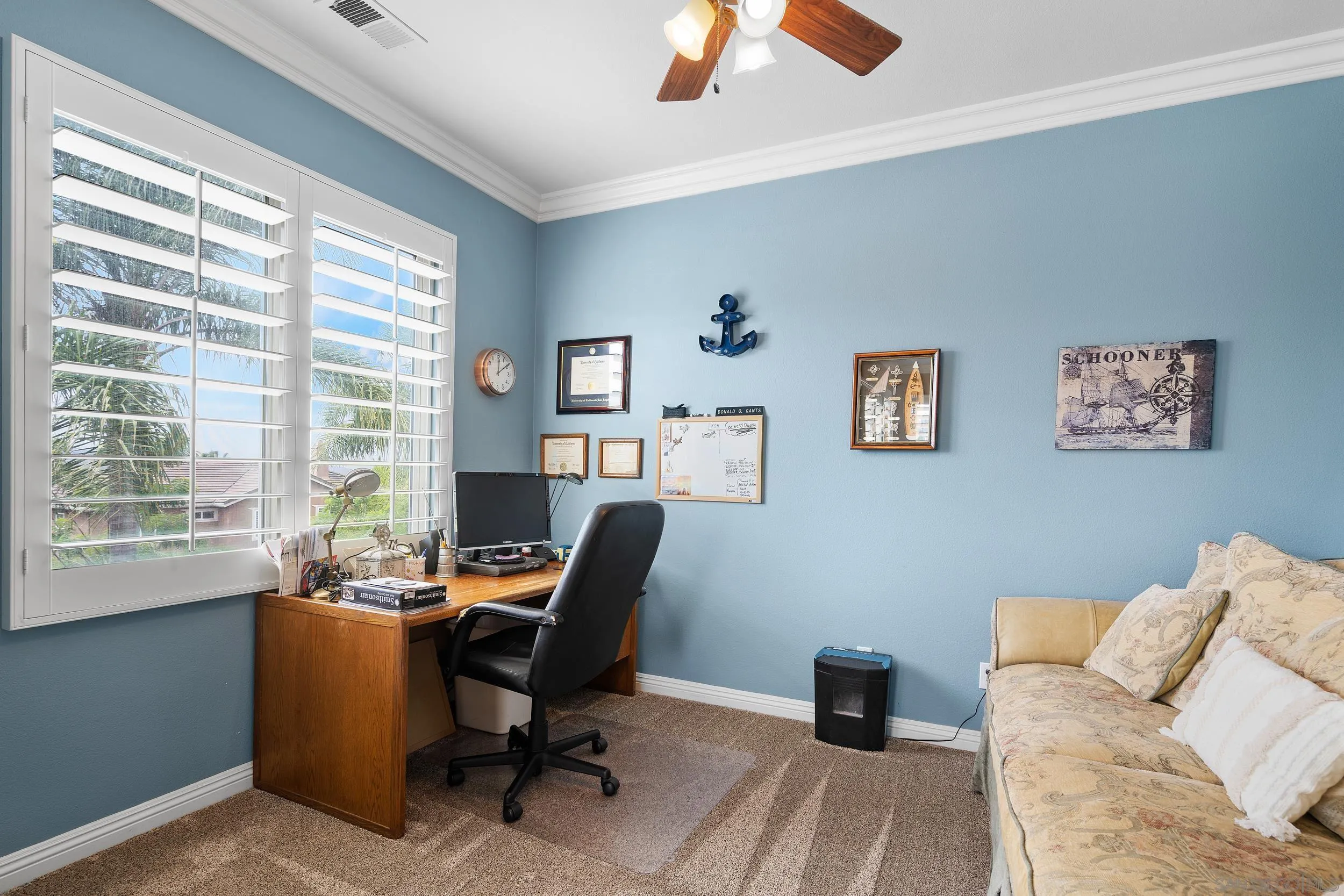 15976 Cayenne Ridge Road San Diego, CA 92127 - Photo 20 of 32 a view of a livingroom with workspace and a window