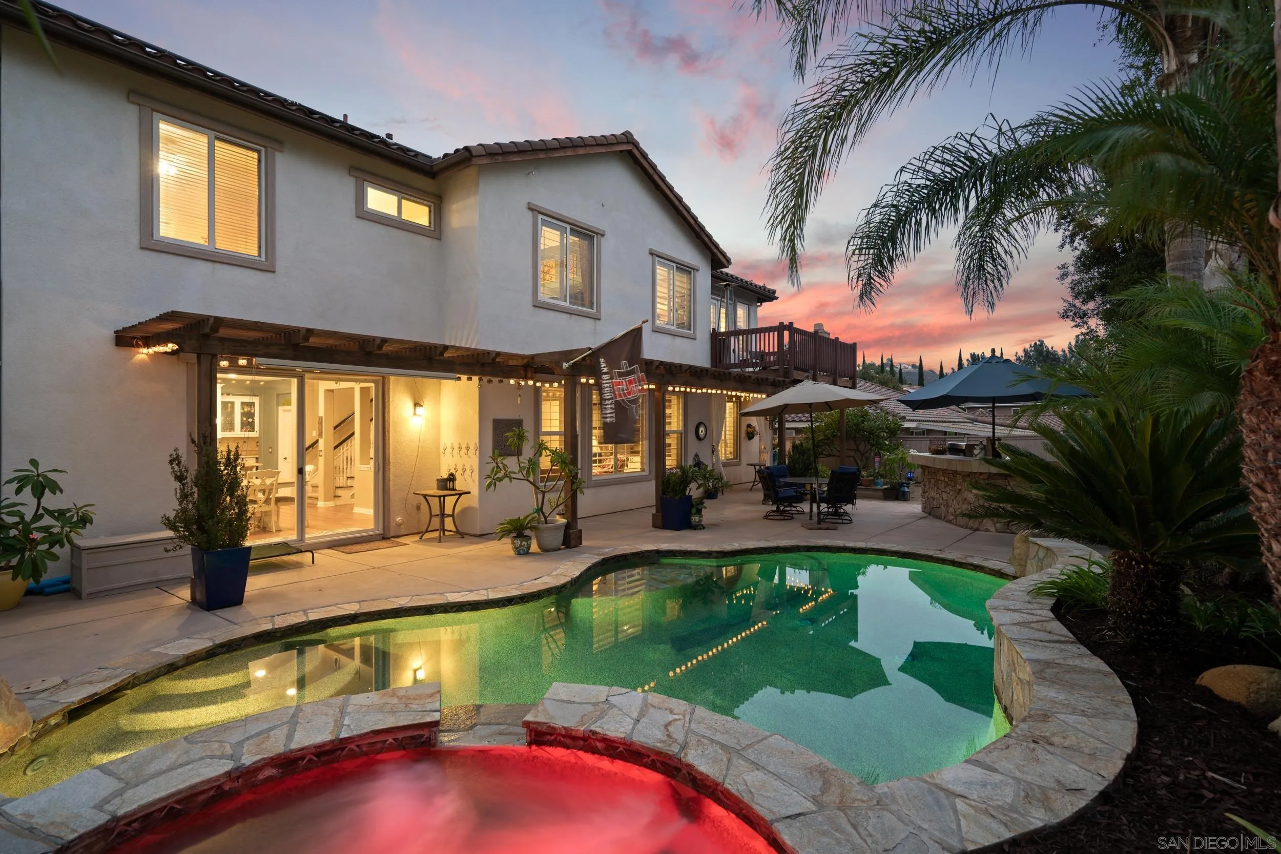 15976 Cayenne Ridge Road San Diego, CA 92127 - Photo 2 of 32 a view of a swimming pool with a patio