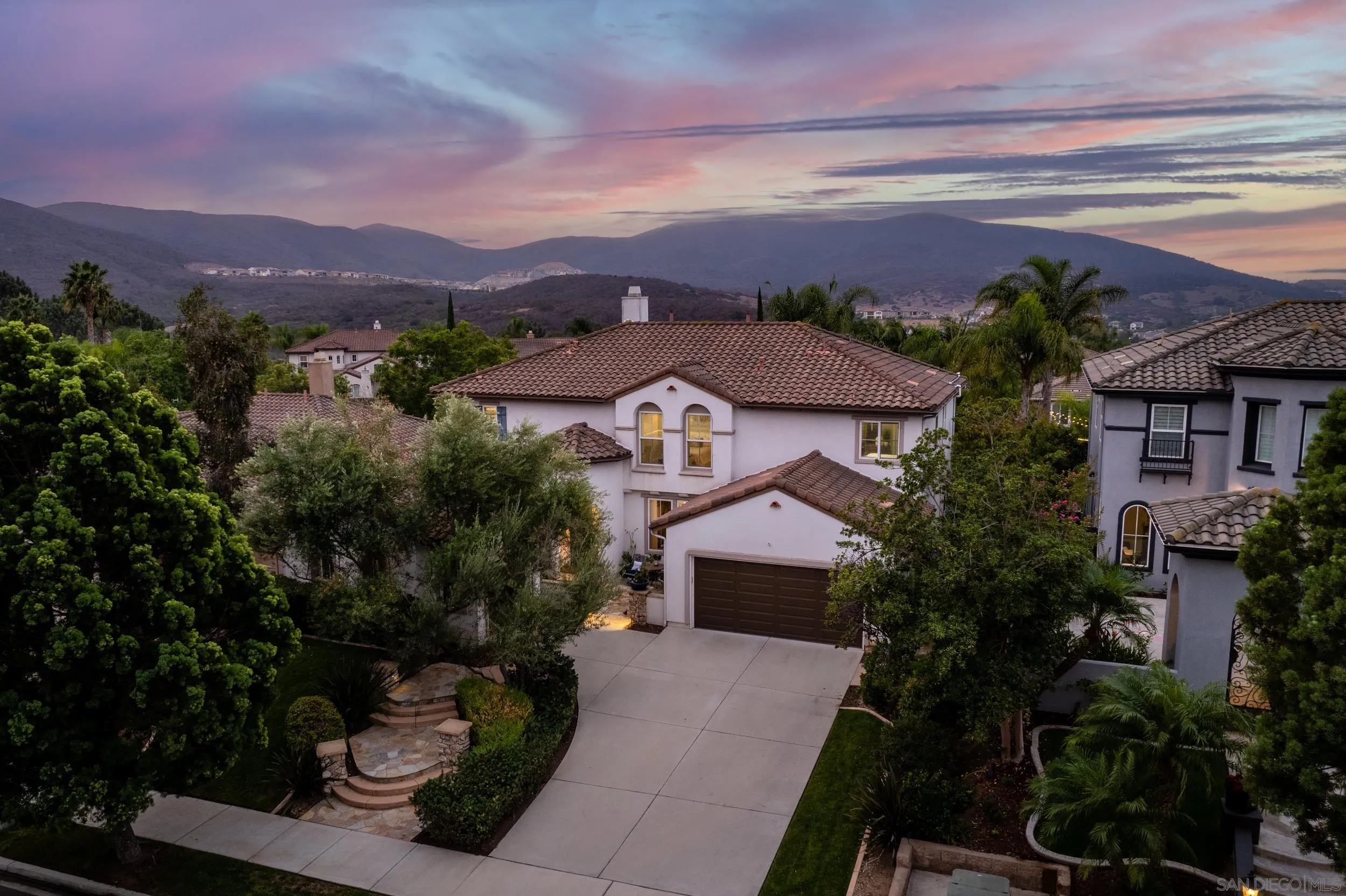 15976 Cayenne Ridge Road San Diego, CA 92127 - Photo 31 of 32 a front view of a house with a yard