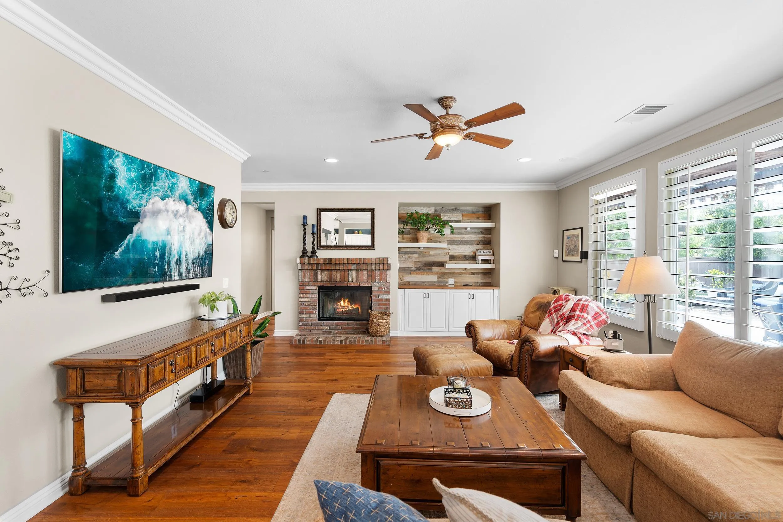 15976 Cayenne Ridge Road San Diego, CA 92127 - Photo 7 of 32 a living room with furniture and a flat screen tv