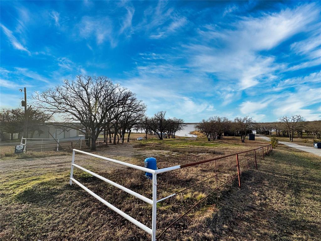 1429 Casino Road Nocona, TX 76255 - Photo 4 of 18 a view of a backyard with sitting area