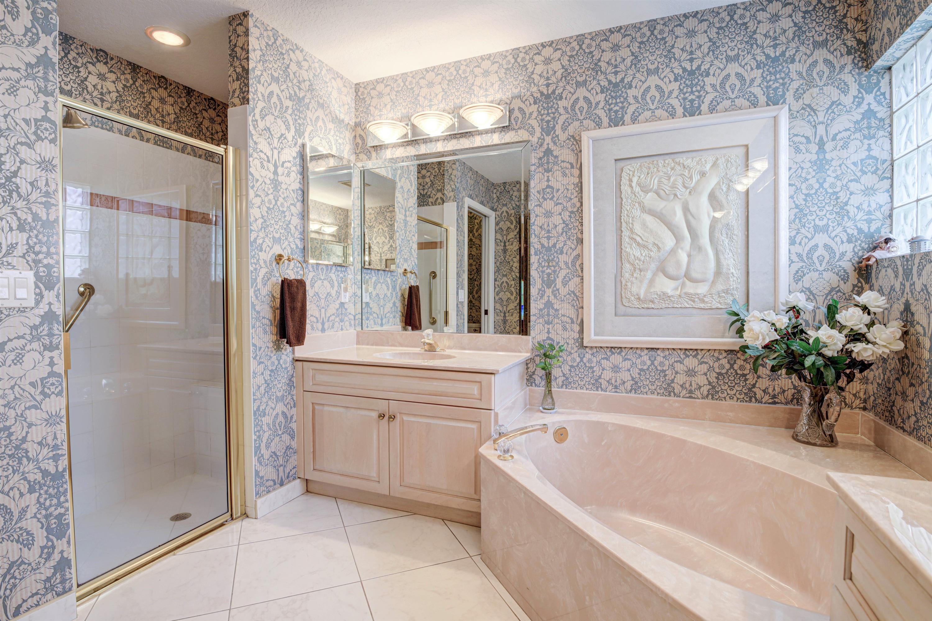 6709 Sun River Road Boynton Beach, FL 33437 - Photo 22 of 51 His vanity & step in shower
