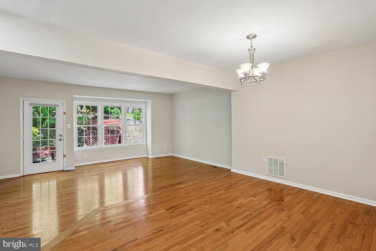 10804 Douglas Avenue Silver Spring, MD 20902 - Photo 10 of 46 Dining room open to living room