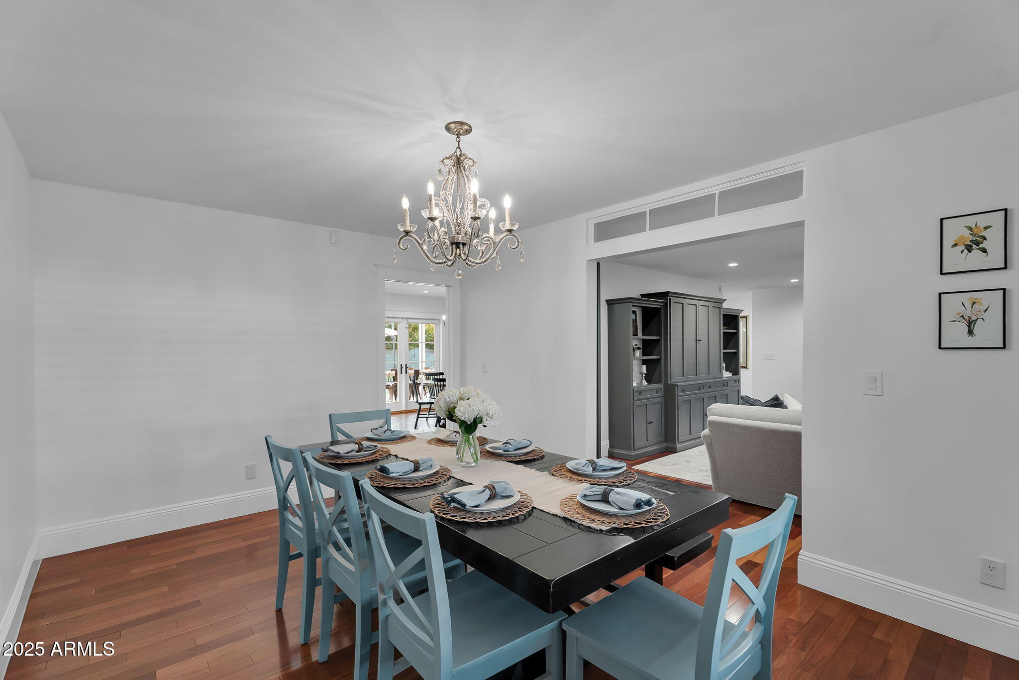229 West Berridge Lane Phoenix, AZ 85013 - Photo 16 of 78 a view of a dining room with furniture and wooden floor