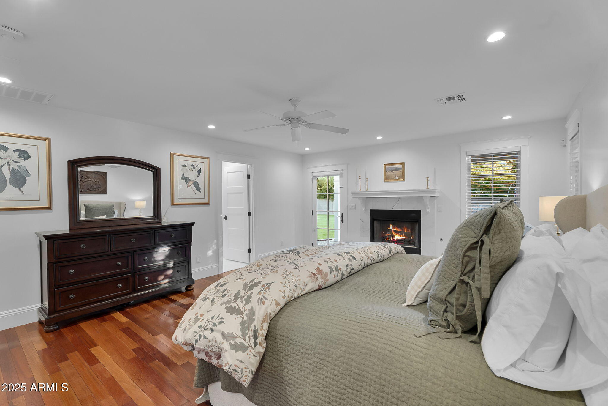 229 West Berridge Lane Phoenix, AZ 85013 - Photo 25 of 78 a bed room with furniture and a fireplace