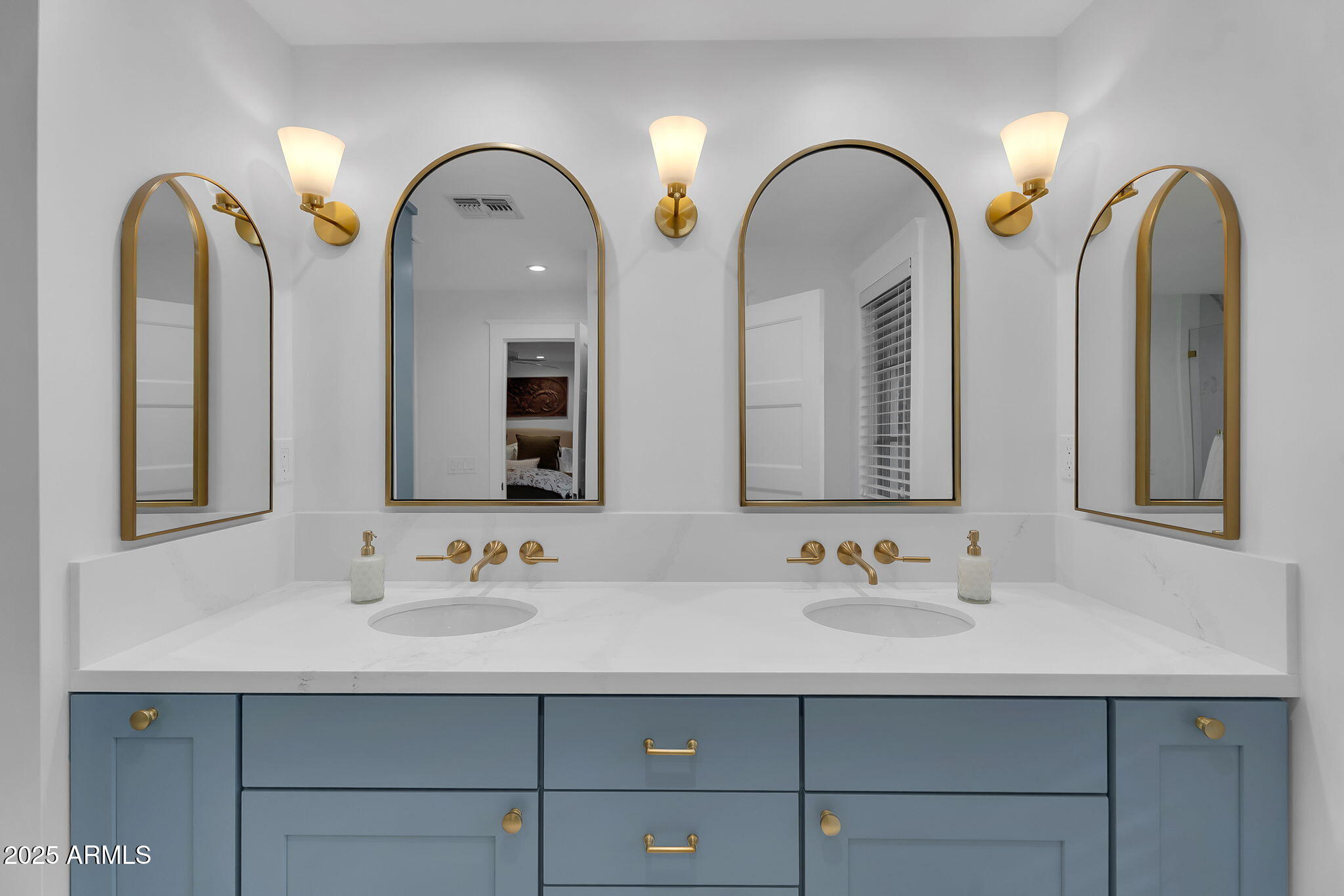 229 West Berridge Lane Phoenix, AZ 85013 - Photo 26 of 78 a bathroom with a double vanity sinks and a vanity