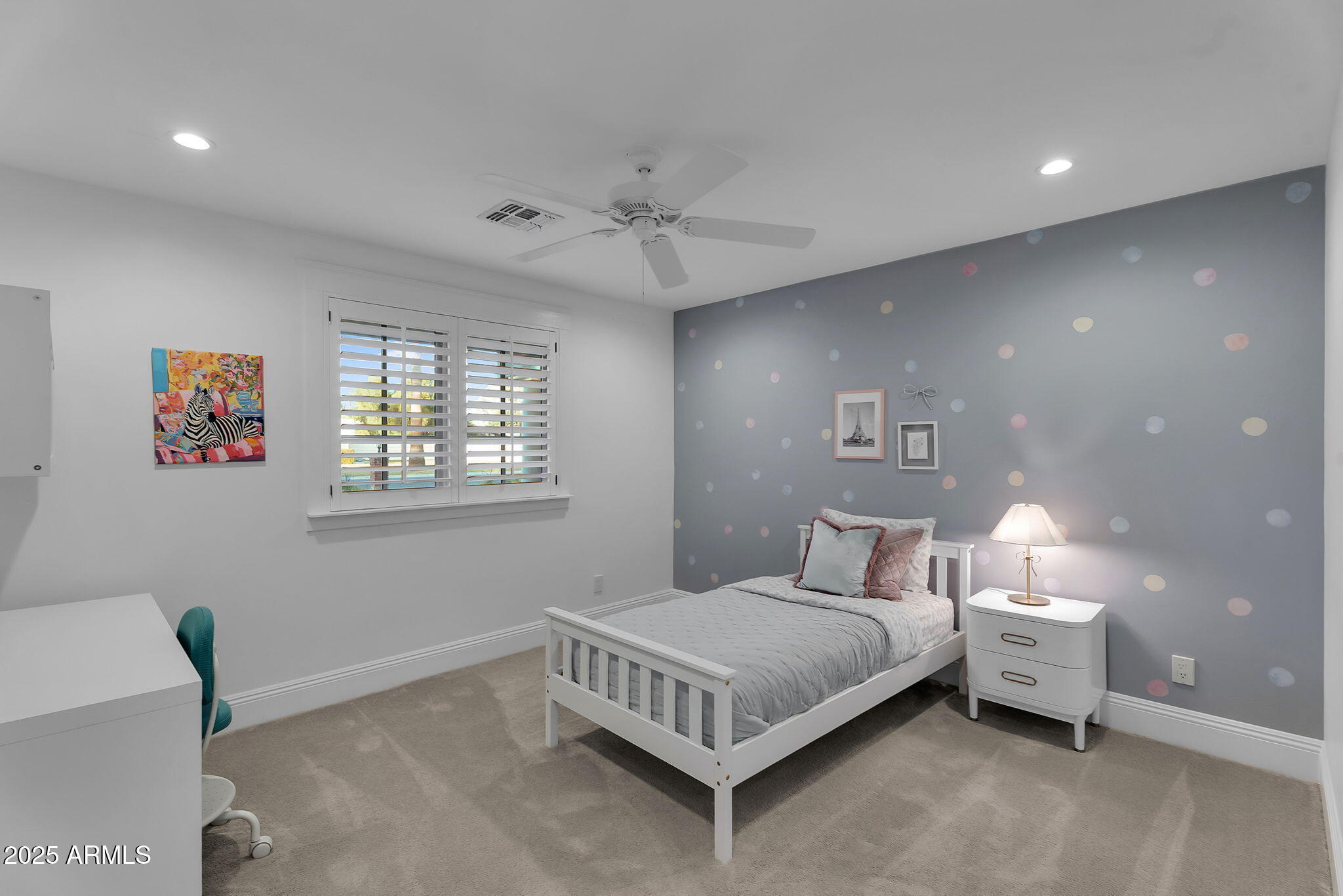 229 West Berridge Lane Phoenix, AZ 85013 - Photo 33 of 78 a bedroom with a bed and a chandelier