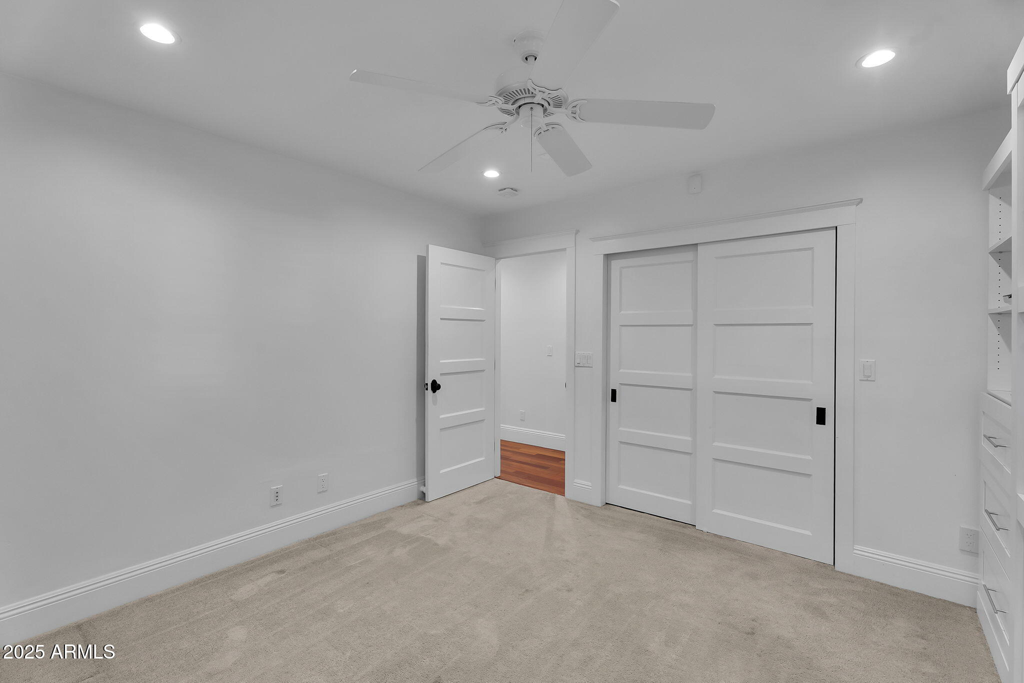 229 West Berridge Lane Phoenix, AZ 85013 - Photo 39 of 78 an empty room with closet and cabinet