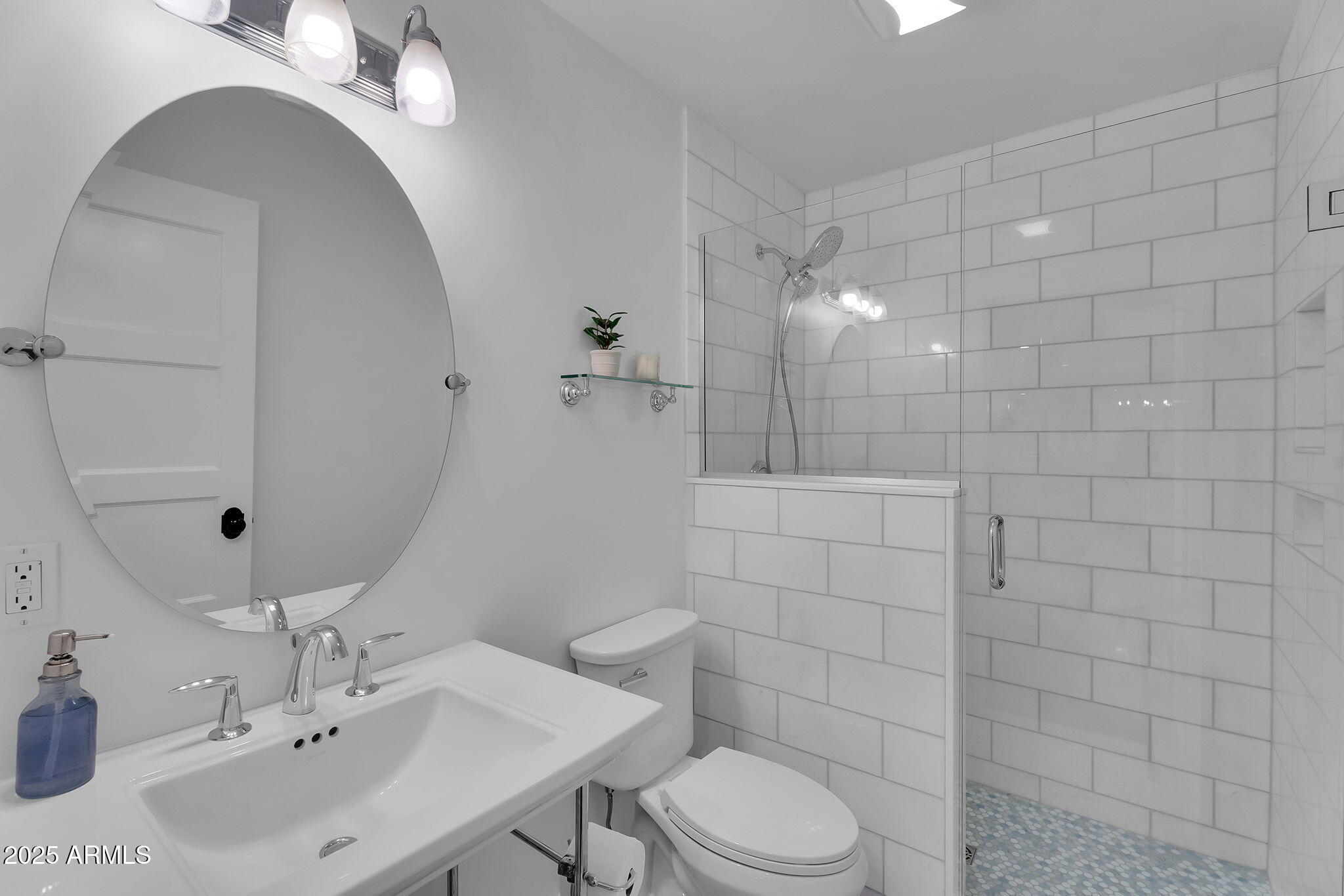 229 West Berridge Lane Phoenix, AZ 85013 - Photo 45 of 78 a bathroom with a sink a toilet and shower