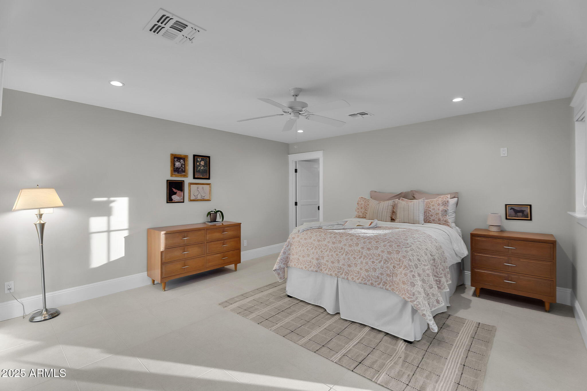229 West Berridge Lane Phoenix, AZ 85013 - Photo 46 of 78 a bedroom with a bed and a night stand