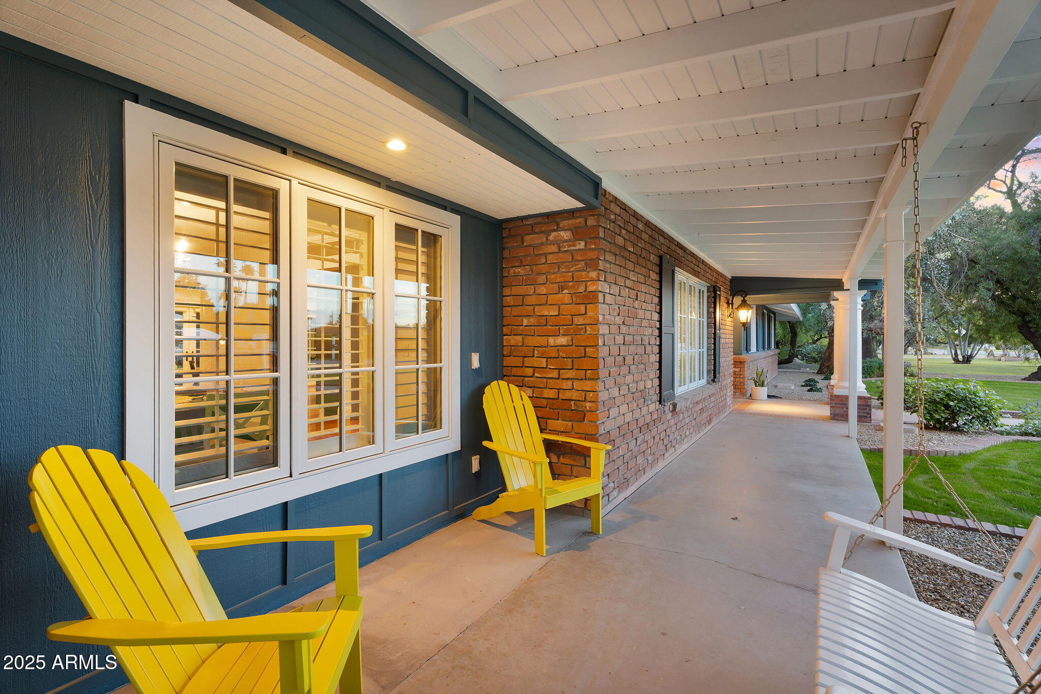 229 West Berridge Lane Phoenix, AZ 85013 - Photo 65 of 78 a view of a patio with table and chairs and wooden floor
