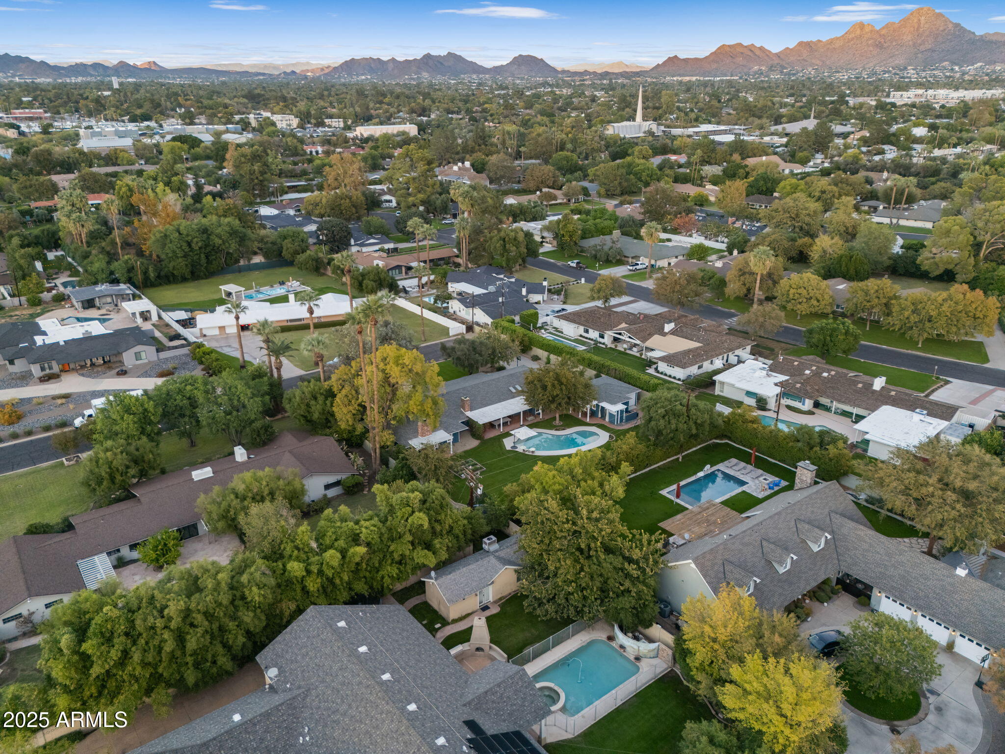 229 West Berridge Lane Phoenix, AZ 85013 - Photo 76 of 78 an aerial view of residential houses with outdoor space