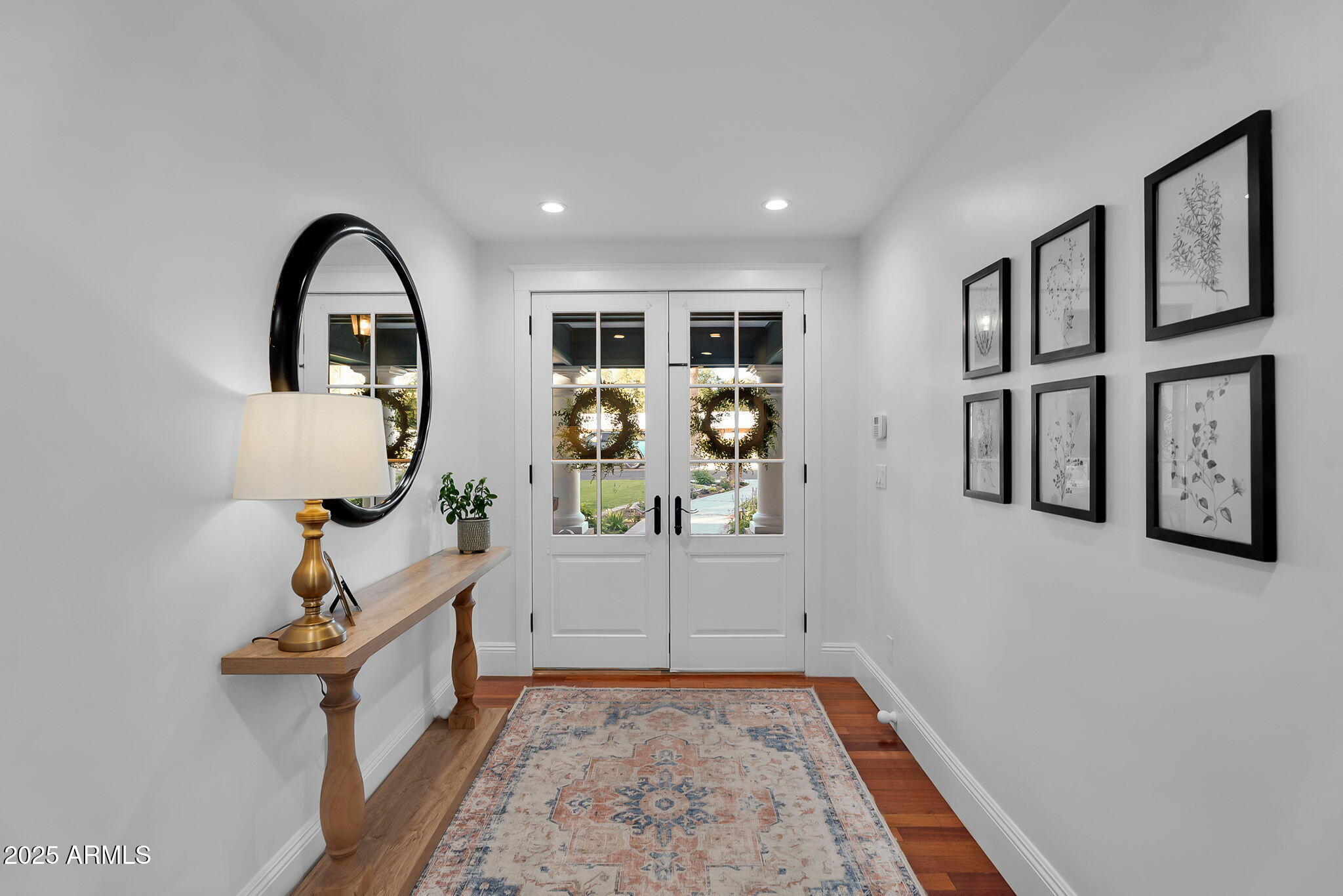 229 West Berridge Lane Phoenix, AZ 85013 - Photo 9 of 78 a view of an entryway with wooden floor