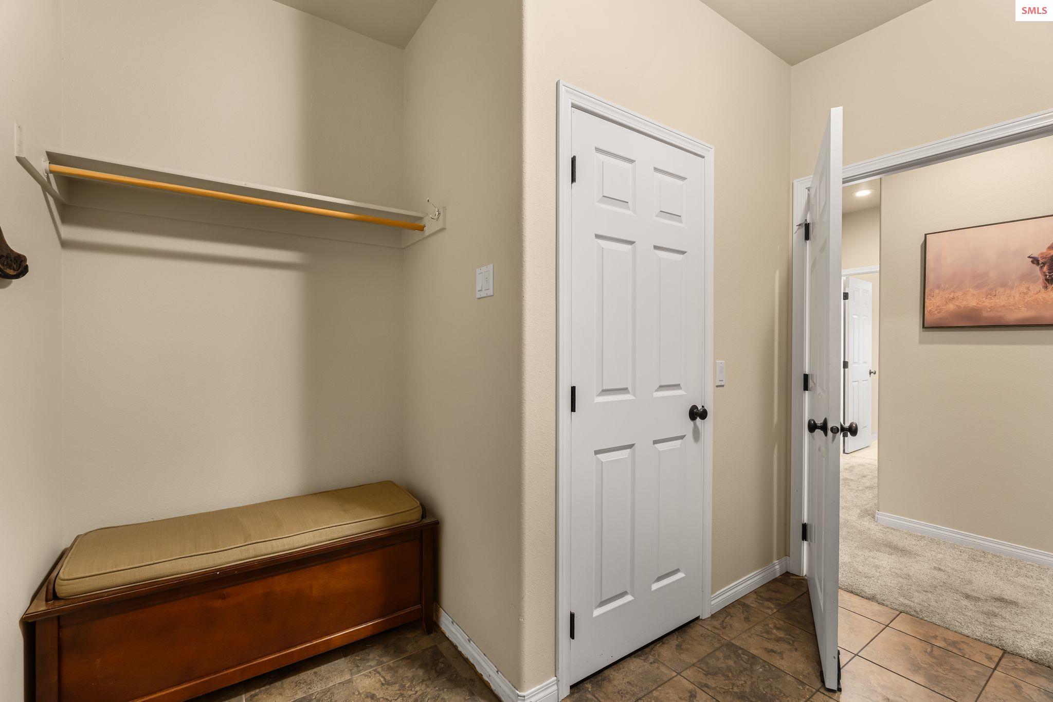 31957 North Wester Ranch Road Athol, ID 83801 - Photo 32 of 66 Laundry room and mudroom combo - with a closet!
