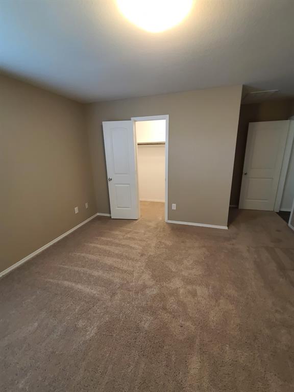4009 Renee Drive Dallas, TX 75227 - Photo 12 of 15 a view of an empty room with a window