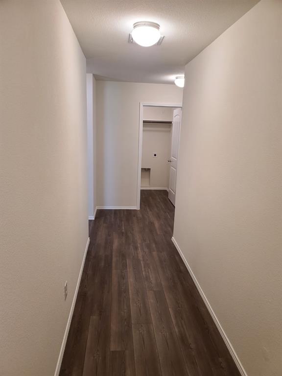 4009 Renee Drive Dallas, TX 75227 - Photo 2 of 15 a view of a small space with wooden floor and a sink