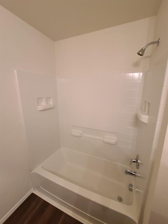 4009 Renee Drive Dallas, TX 75227 - Photo 7 of 15 a bathroom with a bathtub