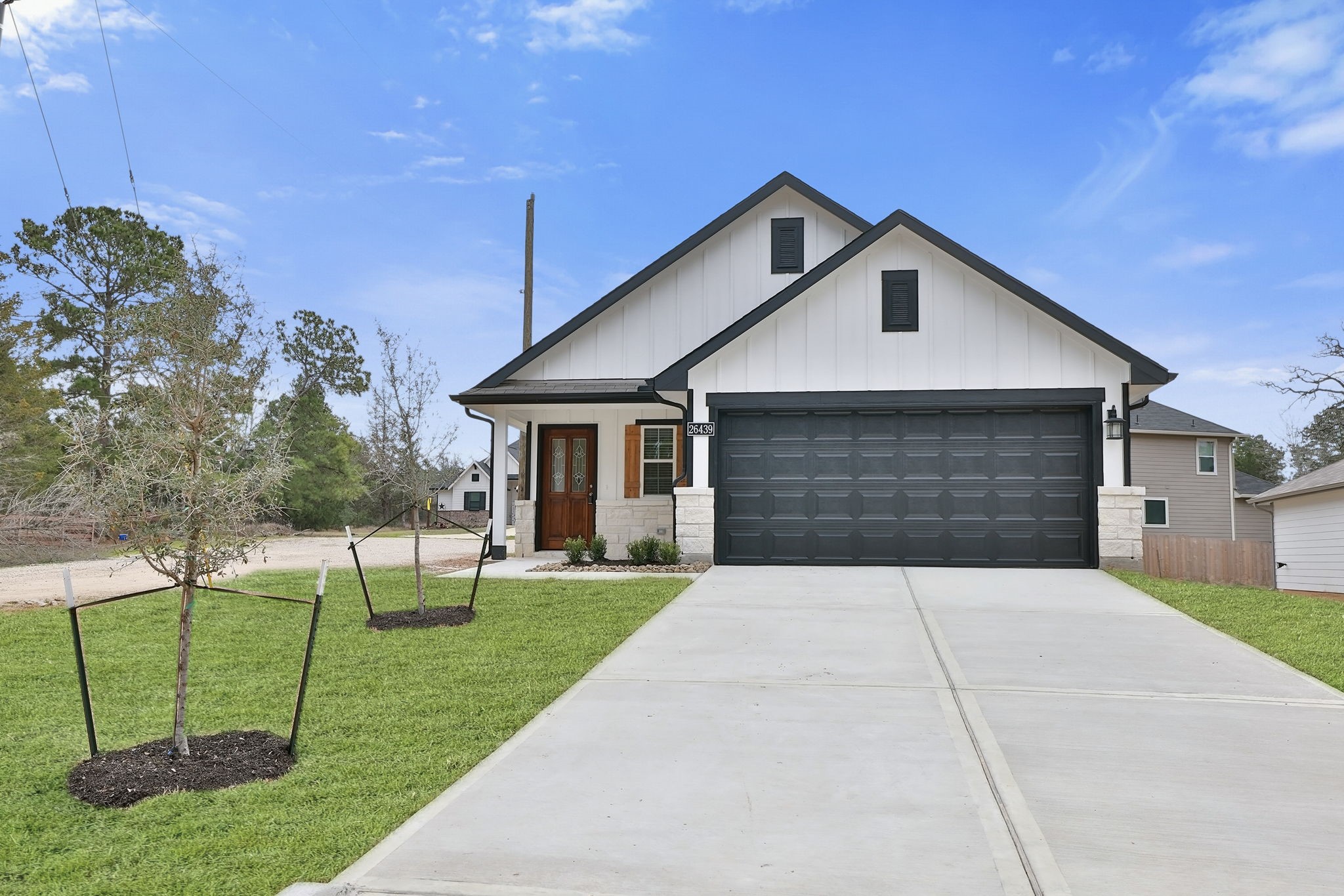 26439 Lake Shore Drive Hempstead, TX 77445 - Photo 1 of 45 a front view of house with yard and green space