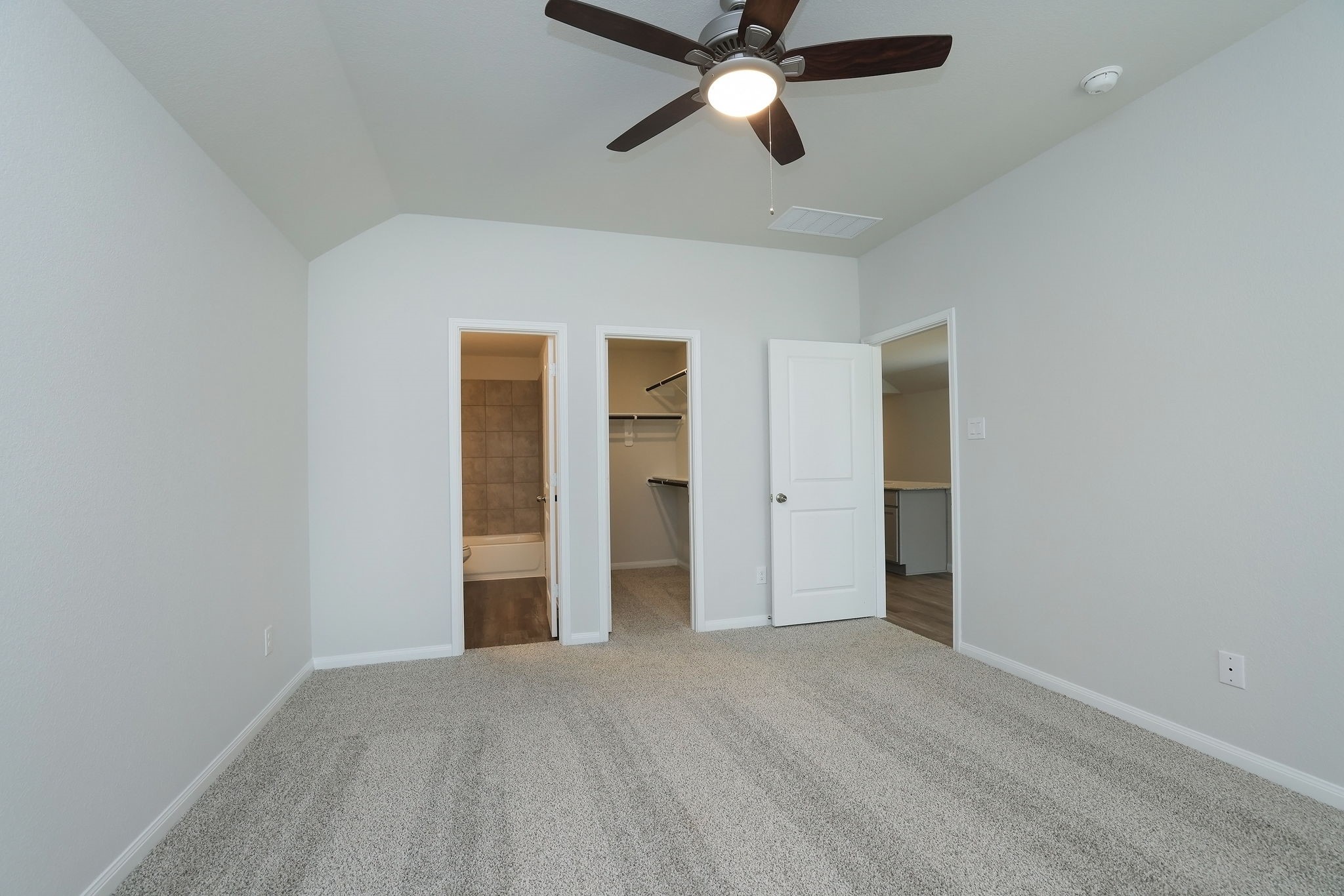 26439 Lake Shore Drive Hempstead, TX 77445 - Photo 16 of 45 an empty room with closet and a ceiling fan