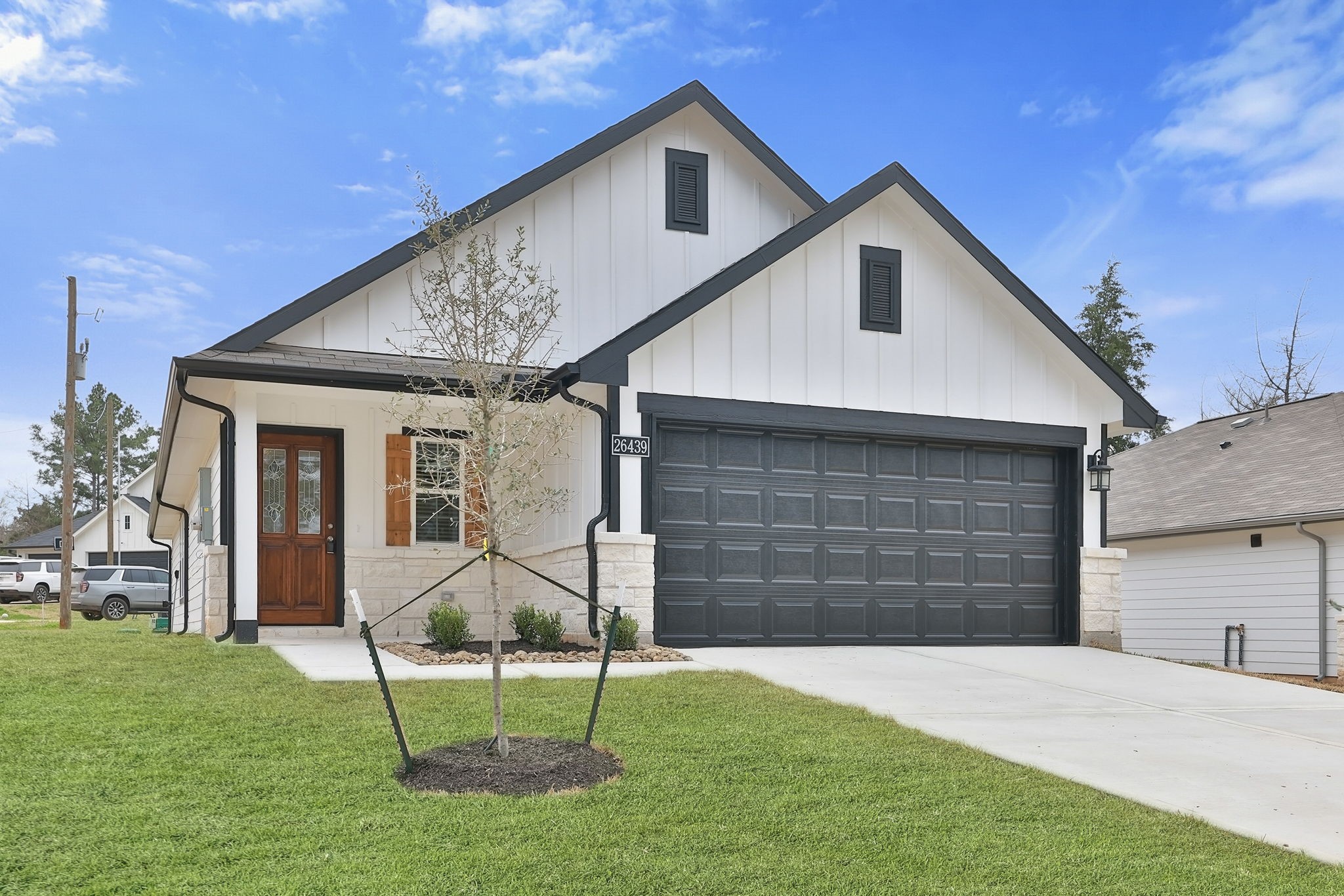26439 Lake Shore Drive Hempstead, TX 77445 - Photo 2 of 45 a front view of a house with a yard