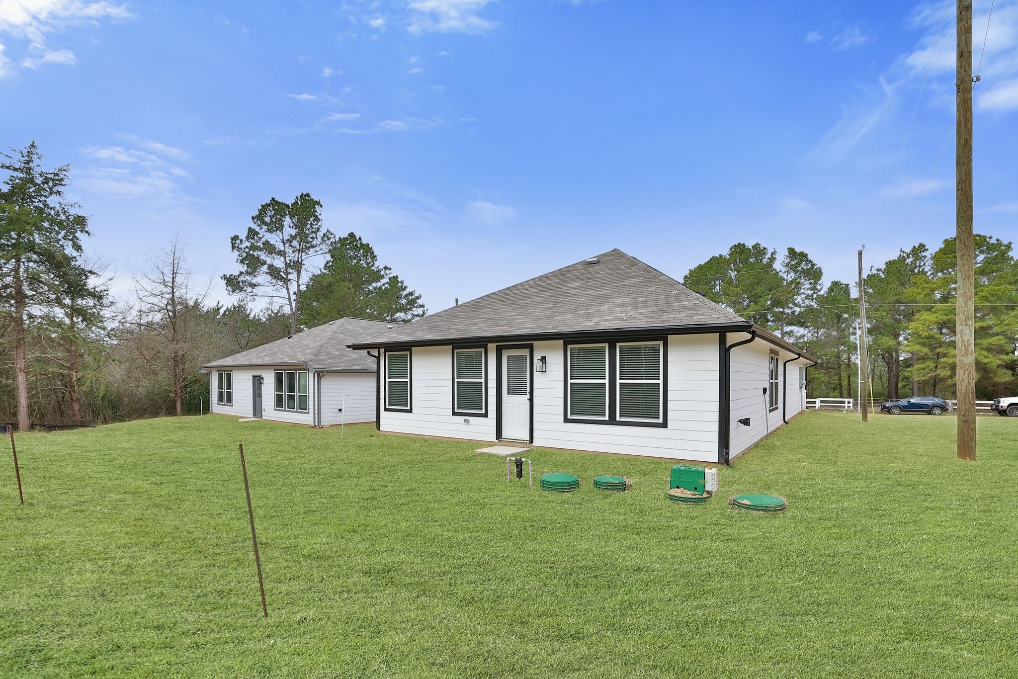 26439 Lake Shore Drive Hempstead, TX 77445 - Photo 29 of 45 a view of a house with a yard
