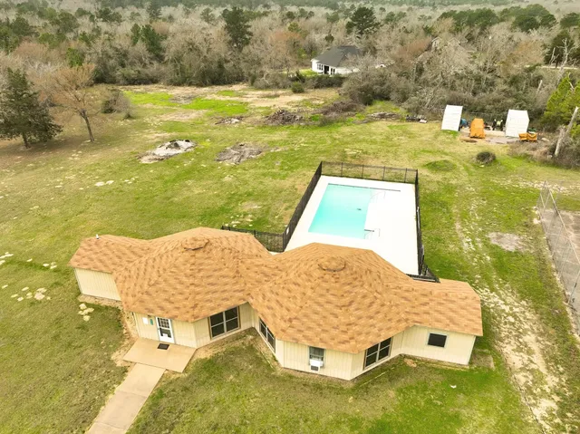 a view of a lake in middle of forest