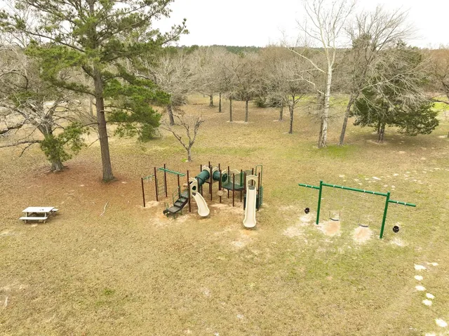a view of a terrace with yard and mountain view