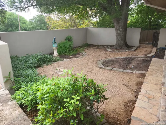 a view of outdoor space and yard