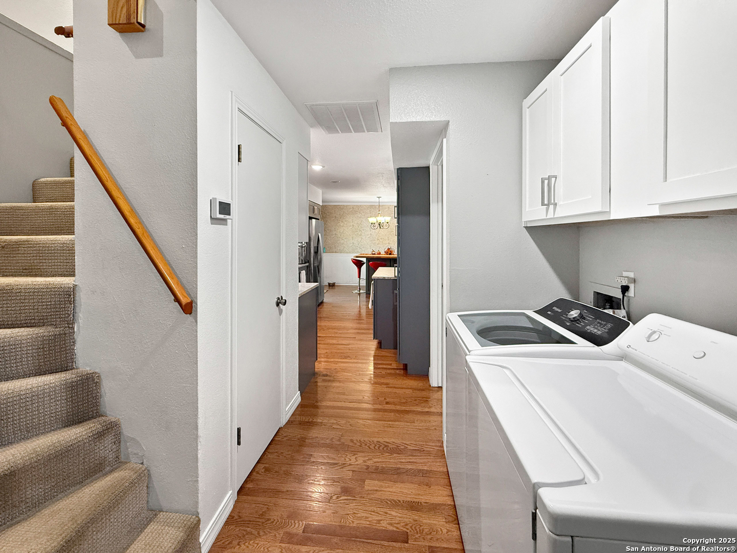 1406 Harper Road Kerrville, TX 78028 - Photo 18 of 33 a view of a kitchen with furniture and staircase