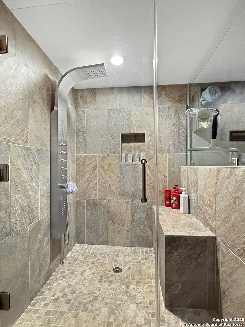 1406 Harper Road Kerrville, TX 78028 - Photo 23 of 33 a bathroom with a sink and a shower