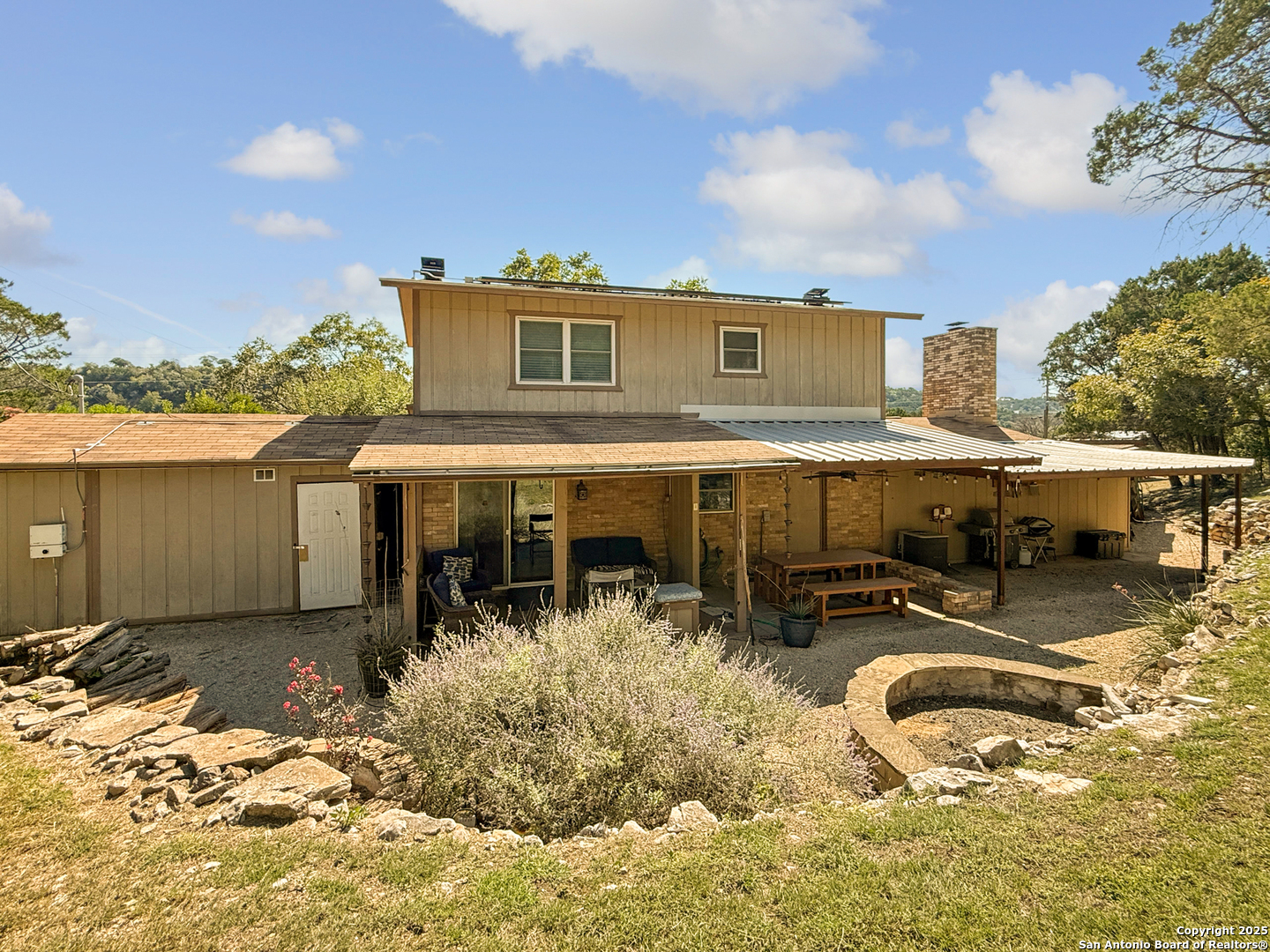 1406 Harper Road Kerrville, TX 78028 - Photo 26 of 33 a view of a patio with wooden fence