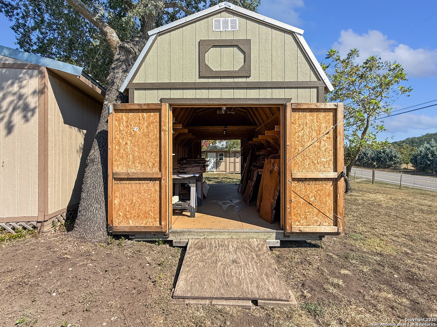 1406 Harper Road Kerrville, TX 78028 - Photo 30 of 33 a view of a garage