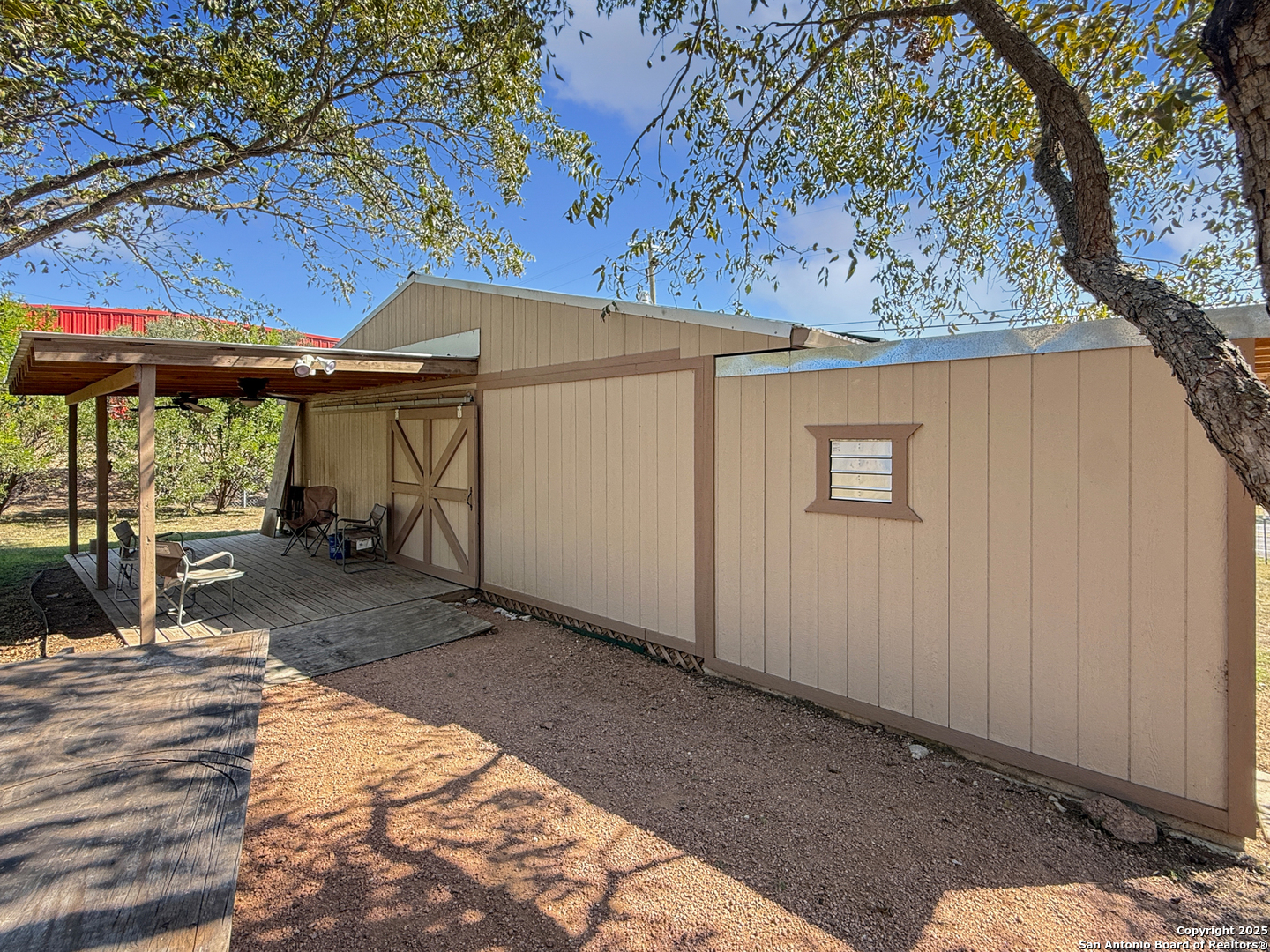 1406 Harper Road Kerrville, TX 78028 - Photo 7 of 33 a view of a backyard