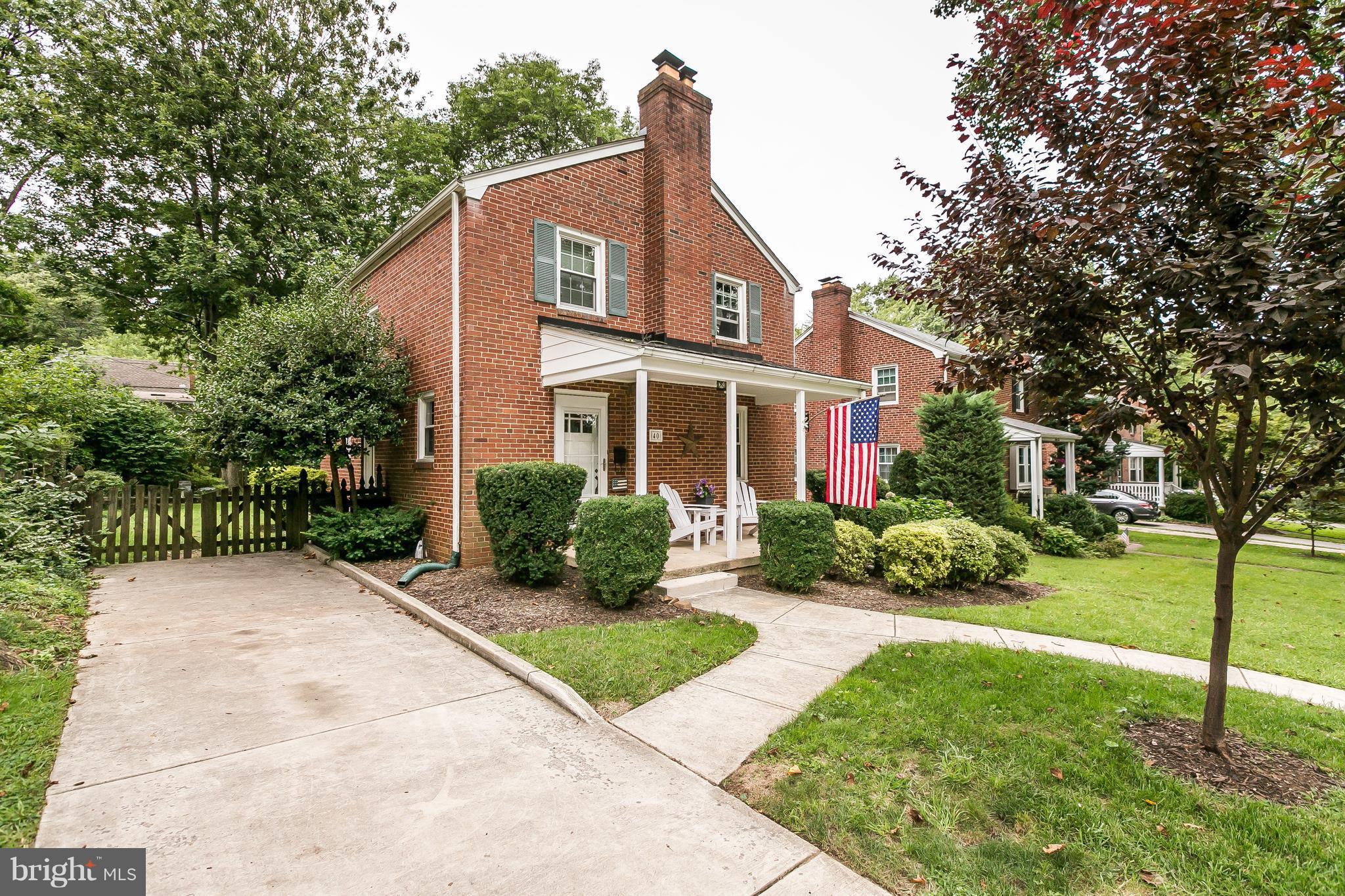 40 Dunvegan Road Baltimore, MD 21228 - Photo 2 of 26 Mature landscaping & graceful curved walkway