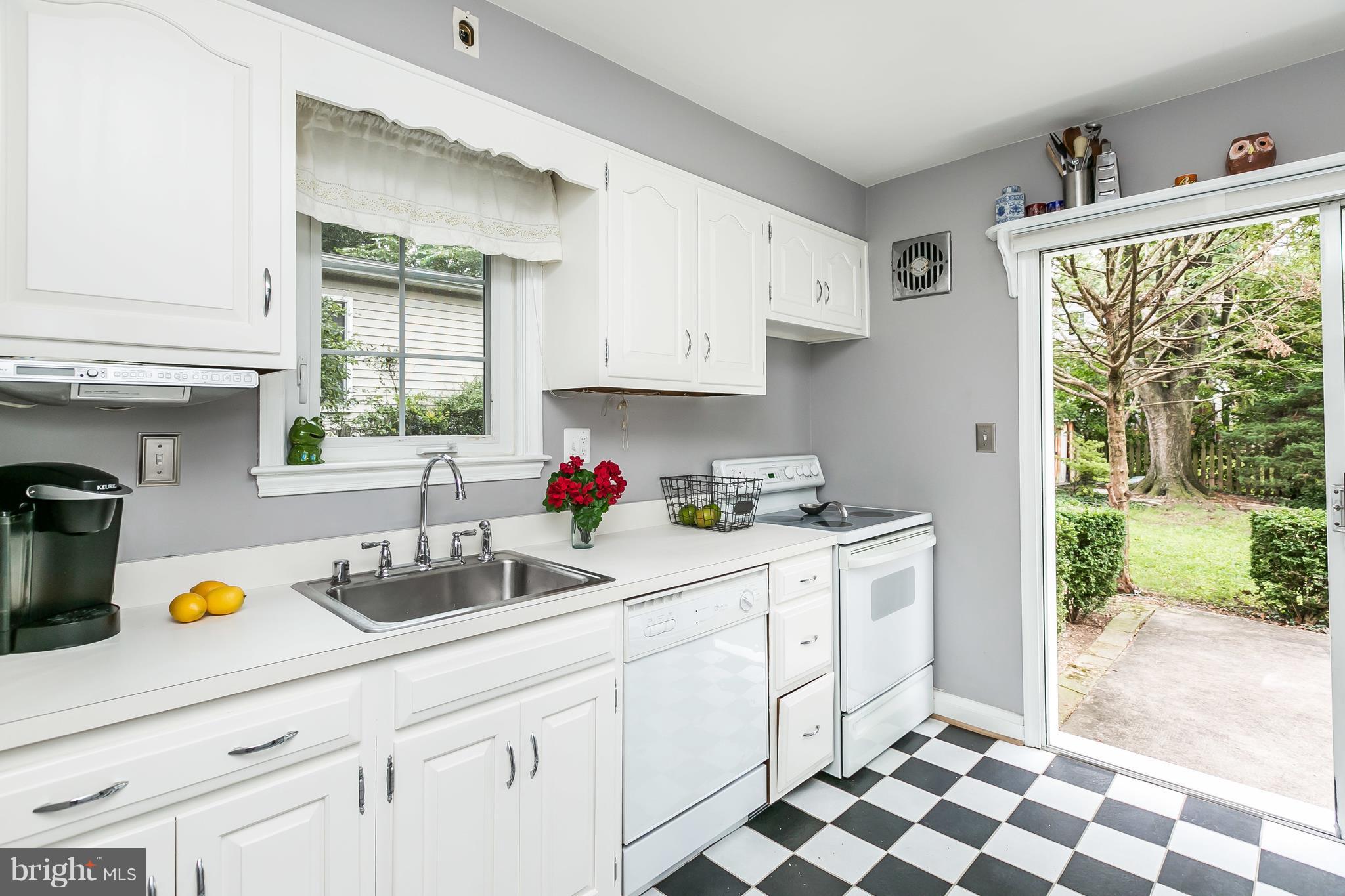 40 Dunvegan Road Baltimore, MD 21228 - Photo 12 of 26 Light filled Kitchen w/ white cabinets