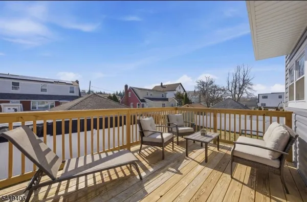 a view of balcony with furniture