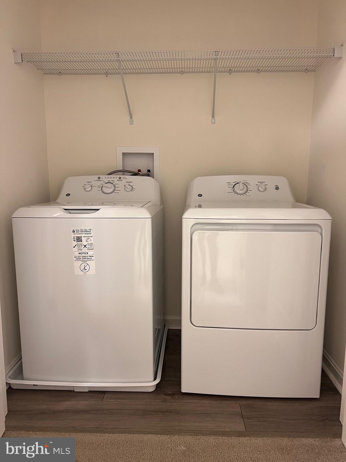 178 North Regulator Drive Cambridge, MD 21613 - Photo 14 of 18 a utility room with dryer and washer