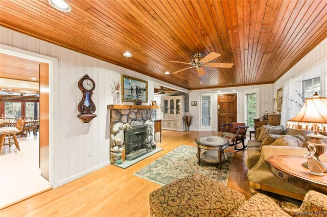 a bedroom with a large bed and a large window with outer view