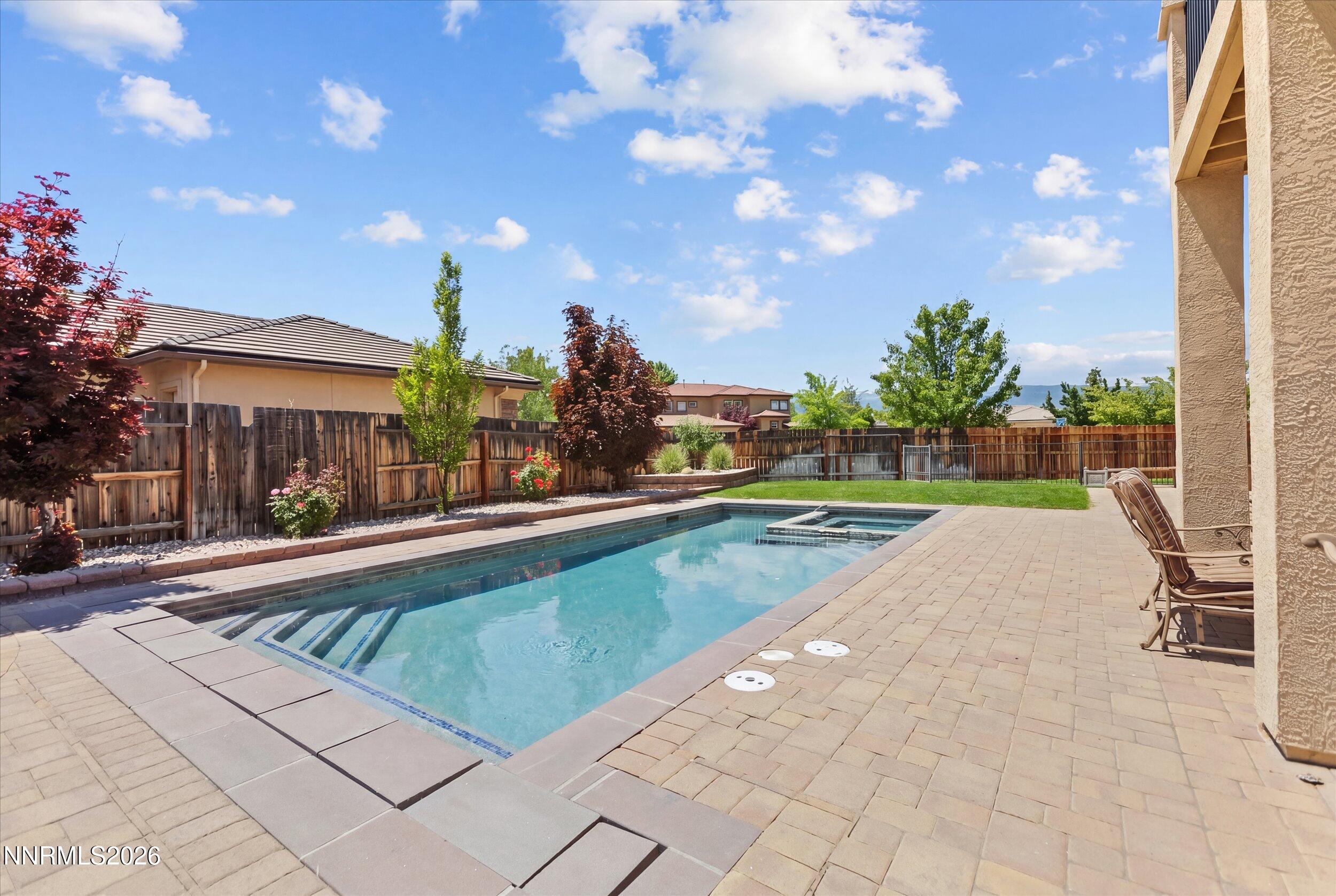 2920 Bull Rider Drive Reno, NV 89521 - Photo 43 of 51 a view of swimming pool with outdoor seating and plants