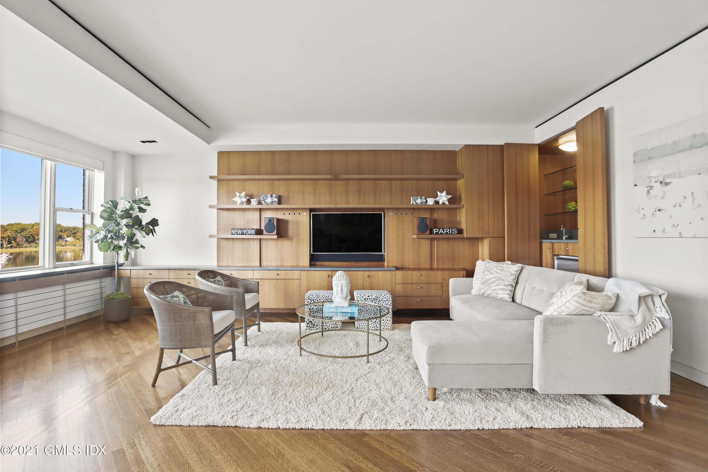 636 Steamboat Road, Unit 4A SOUTH Greenwich, CT 06830 - Photo 13 of 30 a living room with furniture and a flat screen tv