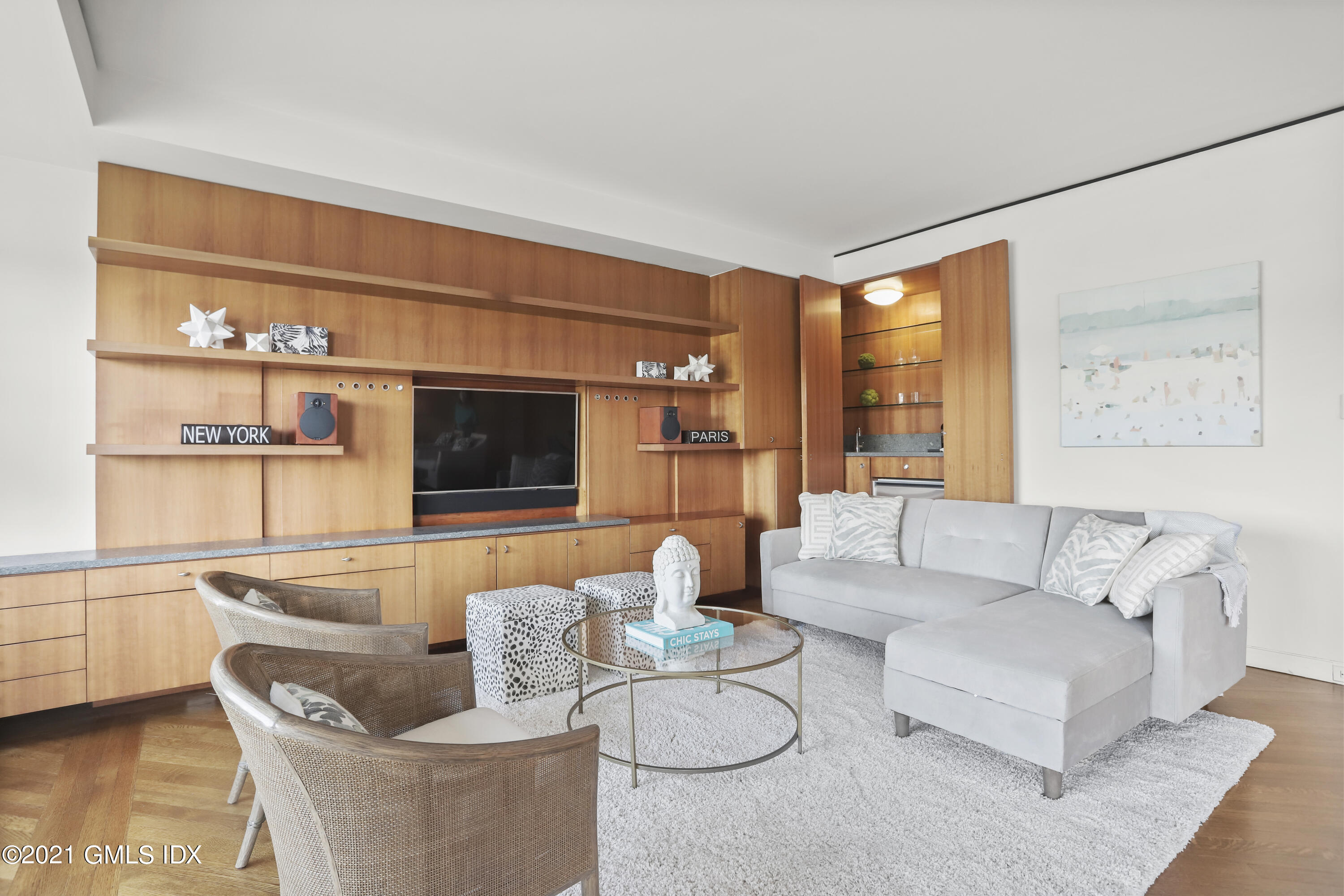 636 Steamboat Road, Unit 4A SOUTH Greenwich, CT 06830 - Photo 14 of 30 a living room with furniture and a flat screen tv