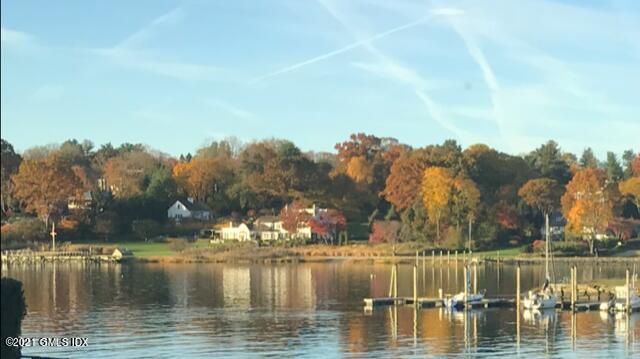 636 Steamboat Road, Unit 4A SOUTH Greenwich, CT 06830 - Photo 2 of 30 a view of a lake with trees