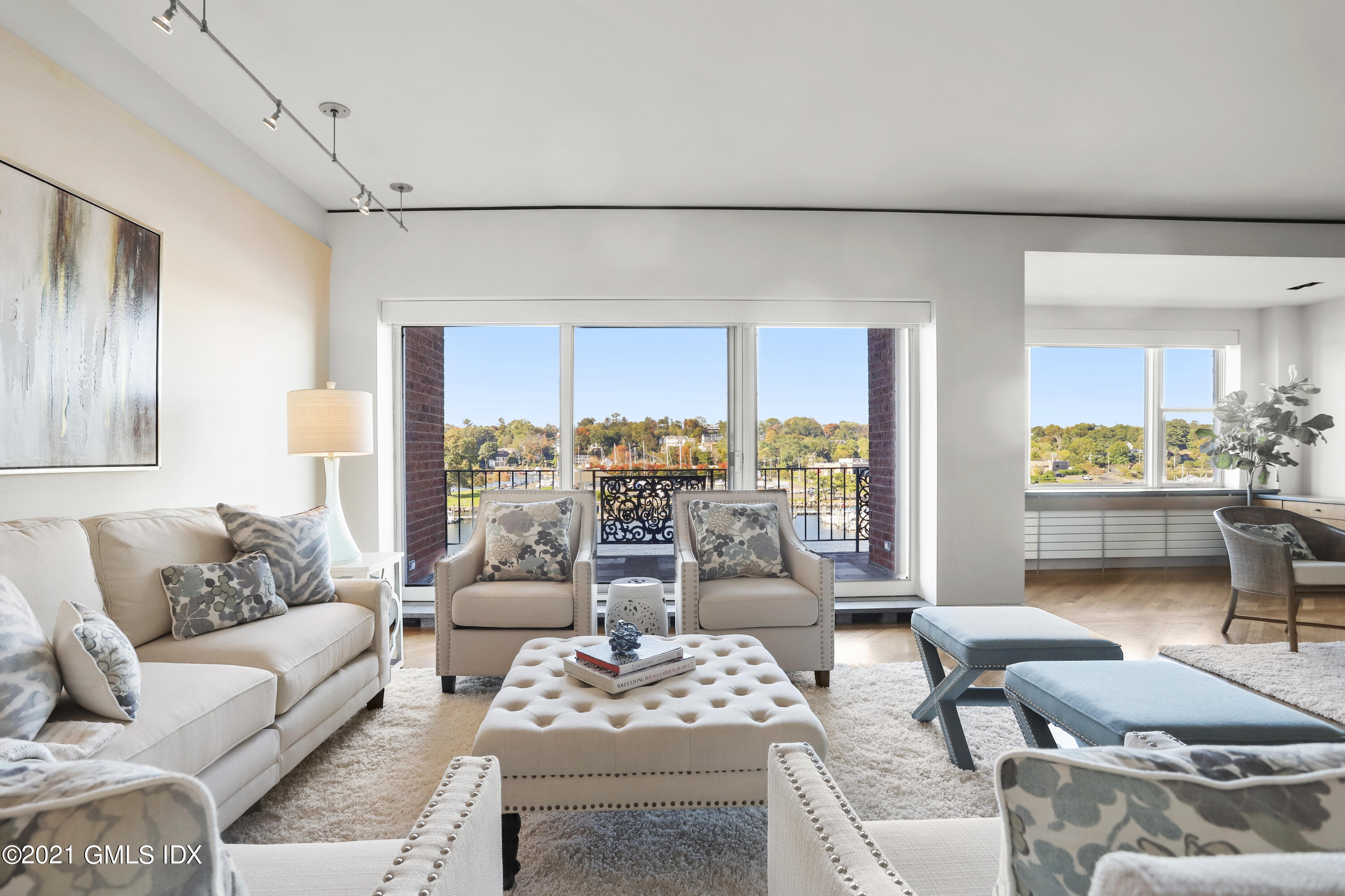 636 Steamboat Road, Unit 4A SOUTH Greenwich, CT 06830 - Photo 6 of 30 a living room with furniture and a large window