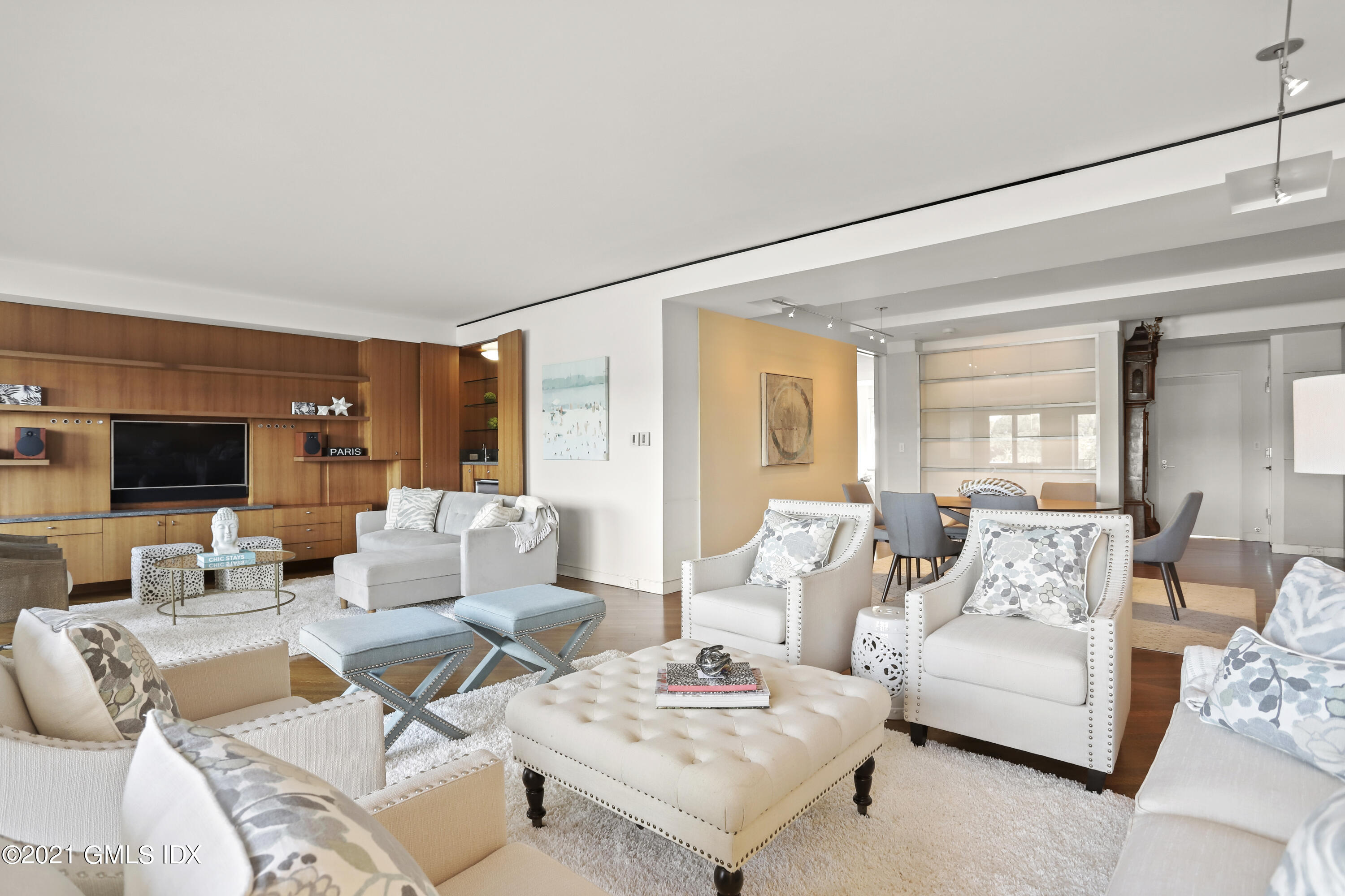 636 Steamboat Road, Unit 4A SOUTH Greenwich, CT 06830 - Photo 10 of 30 a living room with furniture and a flat screen tv