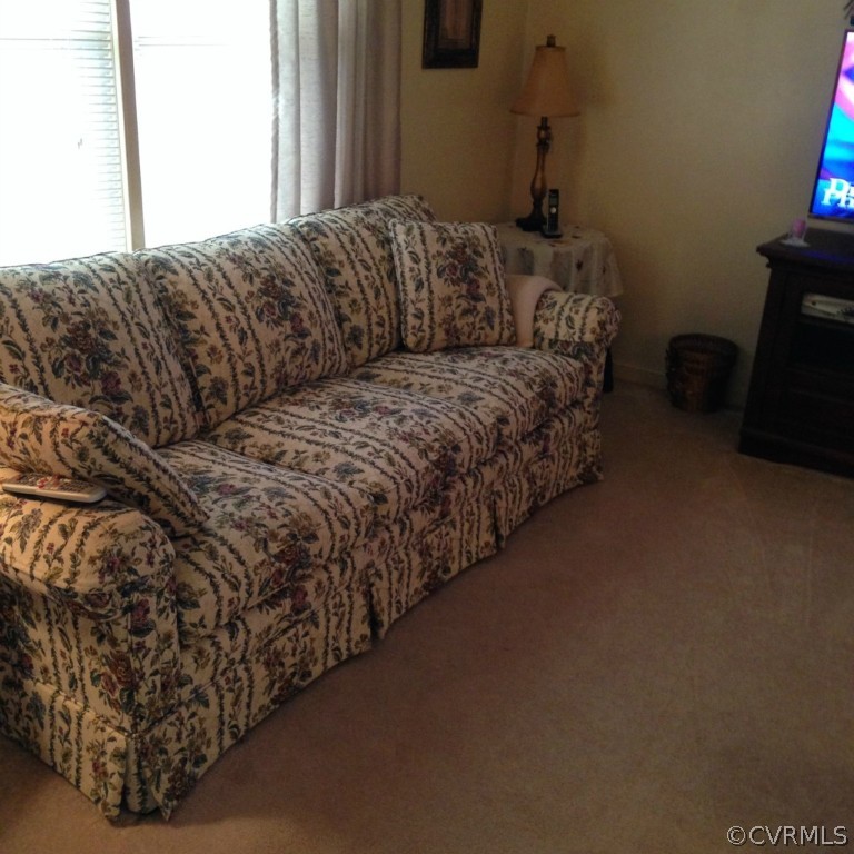 16131 Sandwave Road Chester, VA 23831 - Photo 4 of 24 a living room with a couch