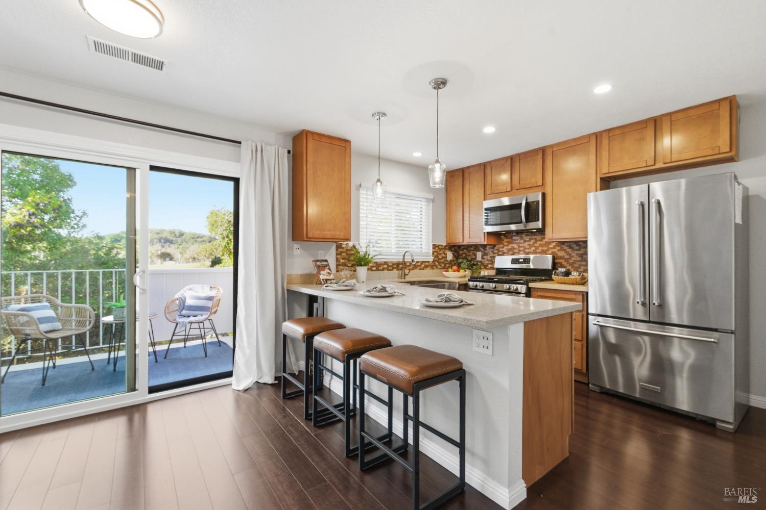 74 Hector Lane Novato, CA 94949 - Photo 14 of 32 a kitchen with stainless steel appliances granite countertop a refrigerator a oven a sink a stove and a refrigerator