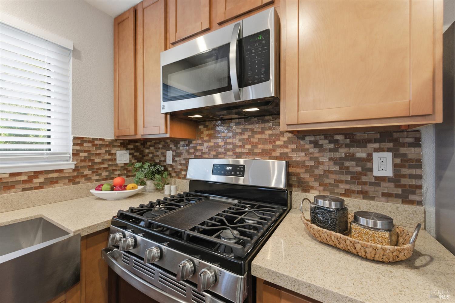 74 Hector Lane Novato, CA 94949 - Photo 15 of 32 a kitchen with a stove and a microwave