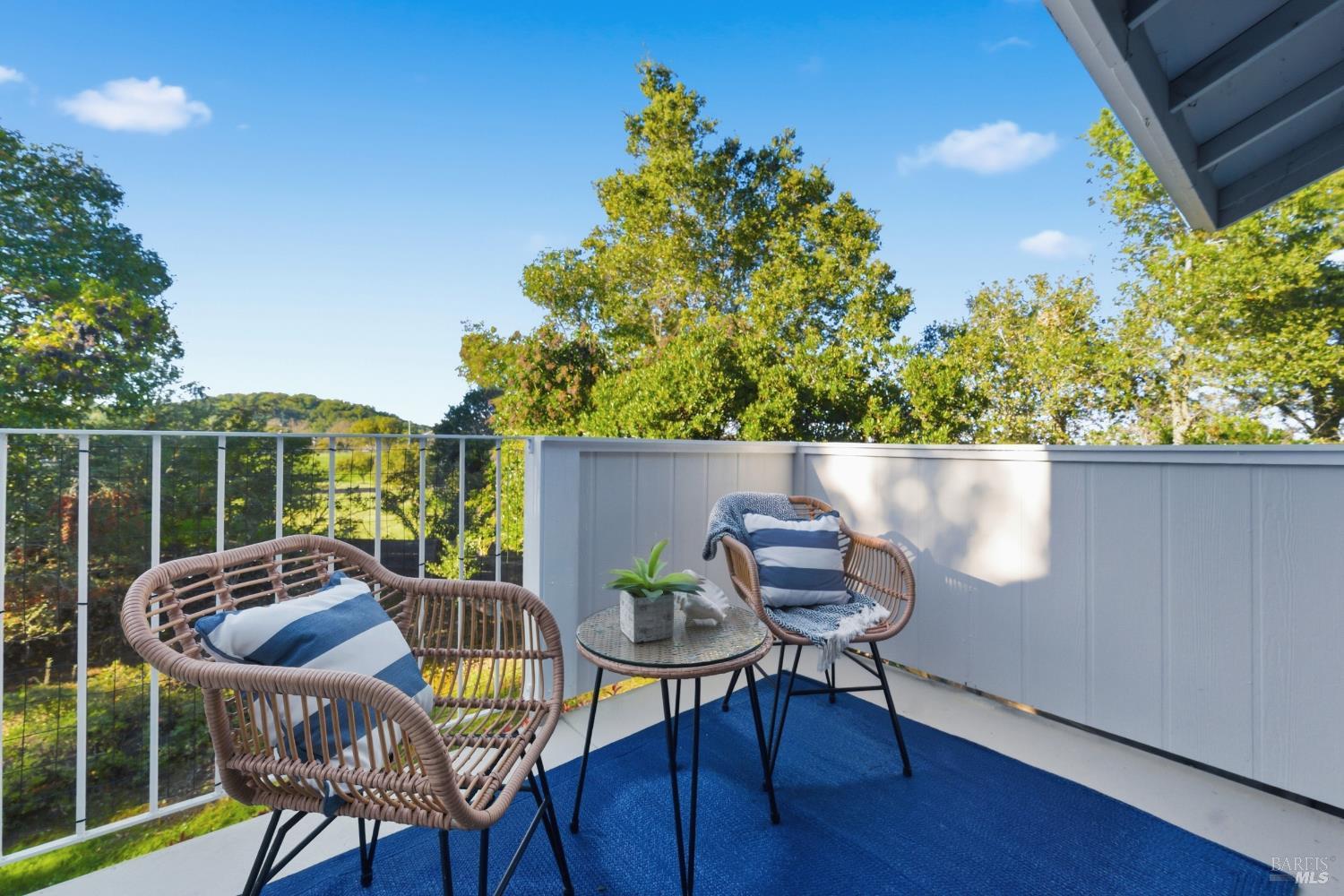 74 Hector Lane Novato, CA 94949 - Photo 18 of 32 a balcony with table and chairs