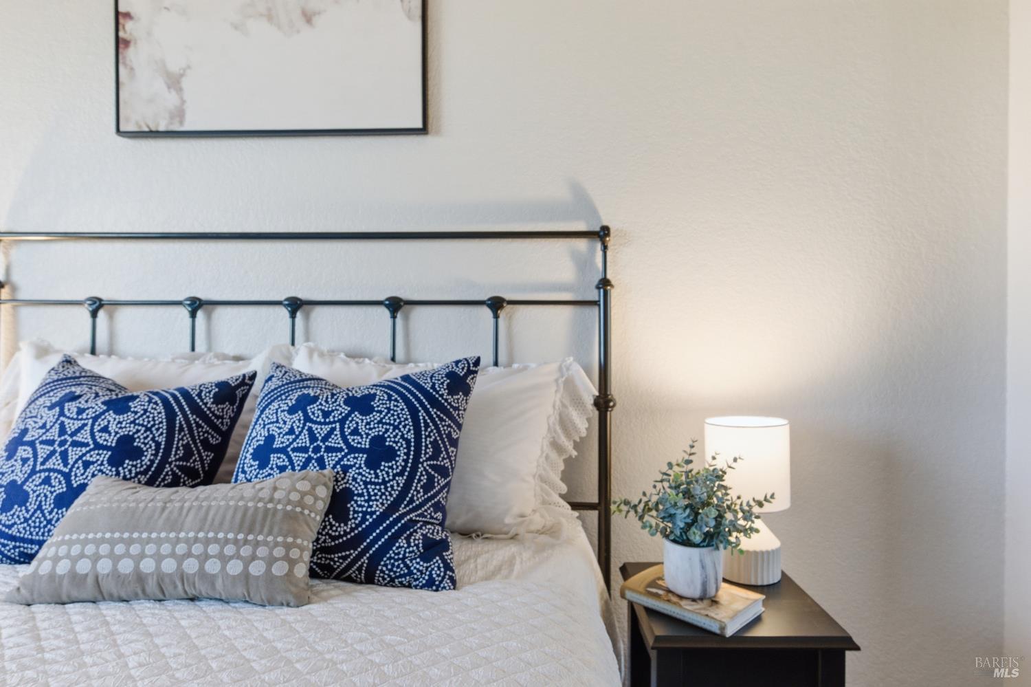 74 Hector Lane Novato, CA 94949 - Photo 24 of 32 a bed sitting in a bedroom and couch