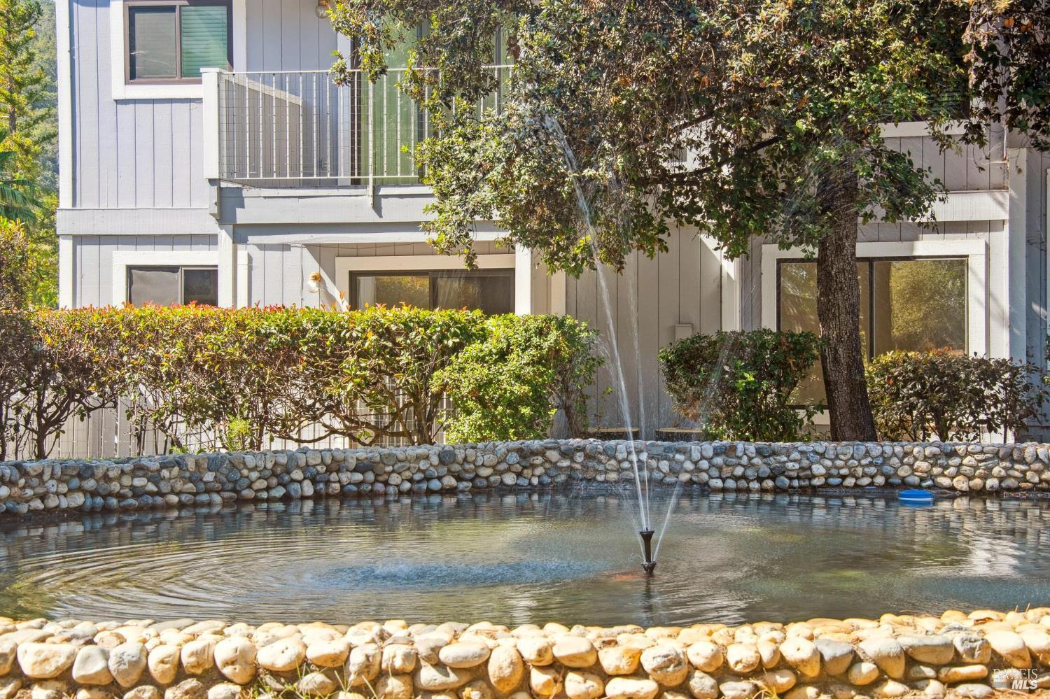 74 Hector Lane Novato, CA 94949 - Photo 4 of 32 a view of a lake with a house